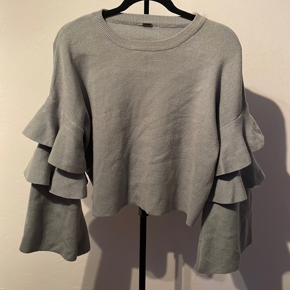 Sage green sweater with tiered bell sleeves